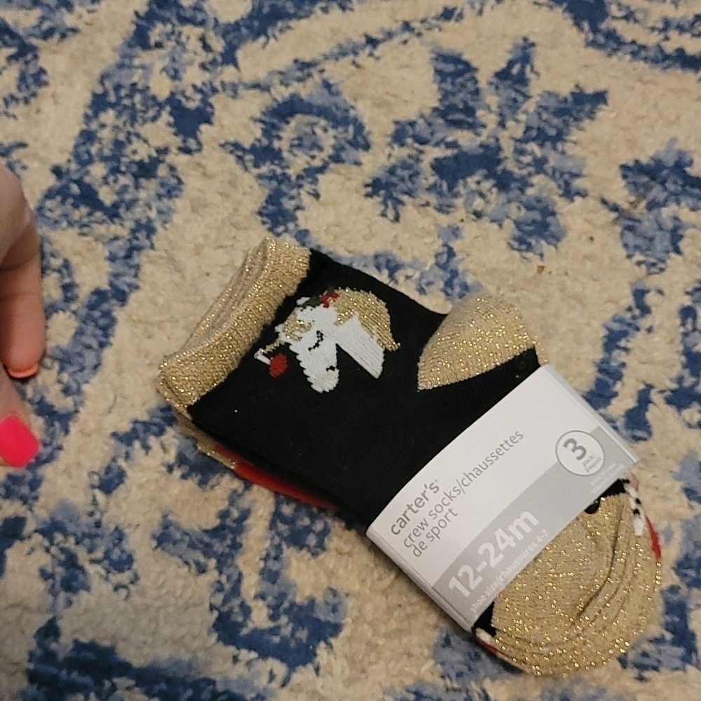 Carters sz 12-24 months unicorn Christmas socks. Free with kid bundle purchase!